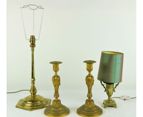 A pair of attractive gilt metal Candlesticks, 28cms (11") high, and a good quality brass Desk Lamp and shade, 40 cms (16") hi