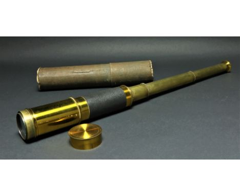 A four stage brass and shagreen bound Marine Telescope, signed, 26" (66cms), extended by canvas tube. (1)
