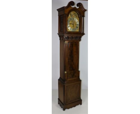 A very good Edwardian mahogany framed Grandfather Clock, decorated in the Georgian taste, with swan neck pediment over engrav