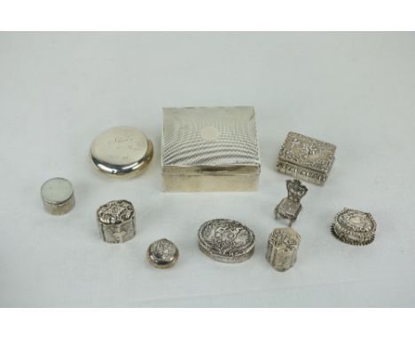 A silver Cigarette Box, and selection of attractive Pill Boxes and Snuff Boxes, etc.,and a small miniature silver chair, and 