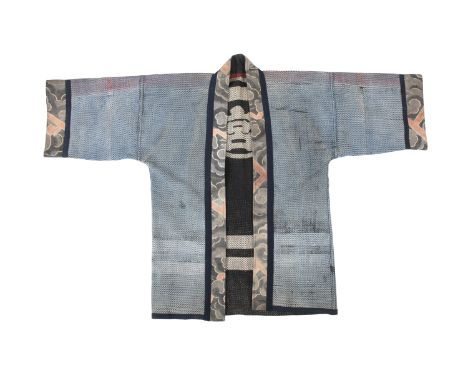 A REVERSIBLE ‘TATTOO’ FIREFIGHTER COAT, HANTEN 半纏  JAPAN, POSSIBLY LATE 19TH CENTURY  This coat is made from multiple layers 