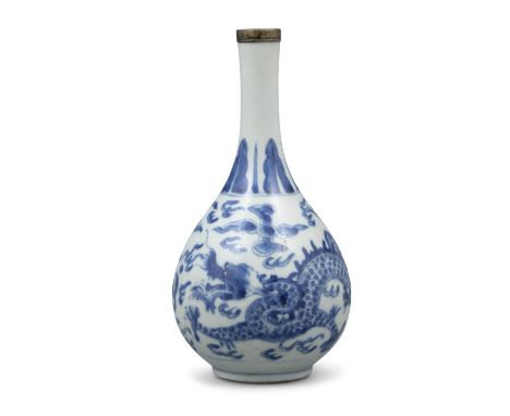 A BLEU DE HUE ‘DRAGON - RỒNG’ PORCELAIN PEAR-SHAPED BOTTLE VASE  VIETNAM, LATE NGUYEN DYNASTY, LATE 19TH CENTURY It rests on 