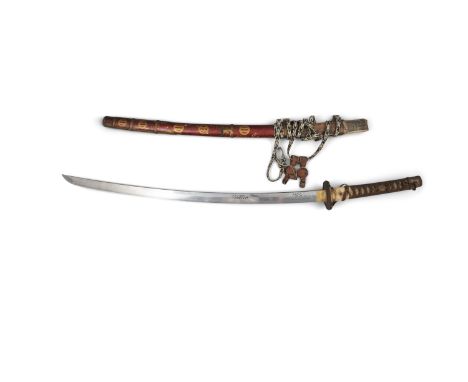 A SAMURAÏ SWORD, KATANA JAPAN, 19TH CENTURY With a blade inscribed with bonji and with a scabbard adorned with mon (heraldic 