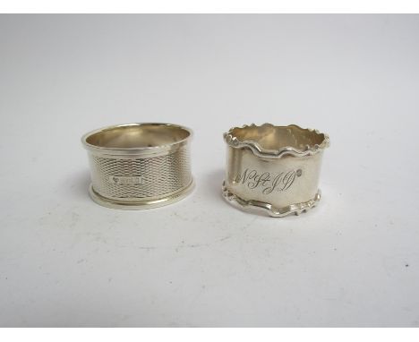 Two silver napkin rings both monogrammed one by William Hutton &amp; Sons, Sheffield 1929, the other by C.J. Vander, Birmingh