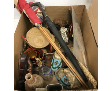 A box containing assorted sundry items to include an enamel decorated glass decanter, a pair of Native American style beaded 