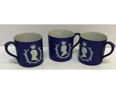 Three Wedgwood blue Jasperware royal commemorative mugs for Edward VIII 1937 and George VI and Elizabeth x 2 each 10 cm diame