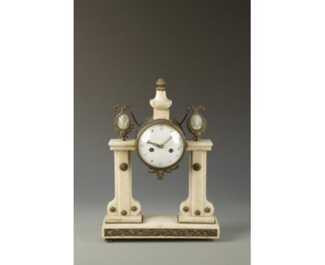 A FRENCH MARBLE AND GILT METAL MOUNTED MANTEL CLOCK, the broad circular convex dial with a two train movement striking on a g