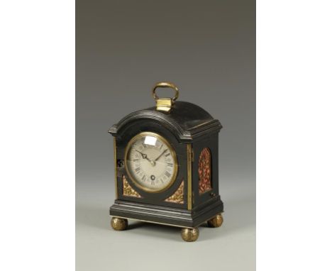 AN EBONISED AND GILT METAL MANTEL CLOCK, the back plate signed James Tick, London, 1745, with a silvered dial with Roman nume