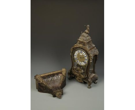A FRENCH BOULE AND ORMOLU BRACKET CLOCK, the gilt metal dial with enamel plaque to the centre signed "Adre Furet, Paris", sur