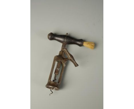 A VINTAGE CORKSCREW, the ebonised handle with brush to one end and gear-wound winding mechanism
