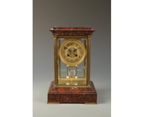 A 19TH CENTURY FRENCH ROUGE MARBLE AND GILT BRASS "FOUR GLASS" MANTEL CLOCK, the dial signed "J. Sewill, 30 Cornhill, London"