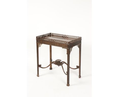 A GEORGE III STYLE MAHOGANY SILVER TABLE of Chinese Chippendale design, the rectangular top with a pierced fretwork gallery o