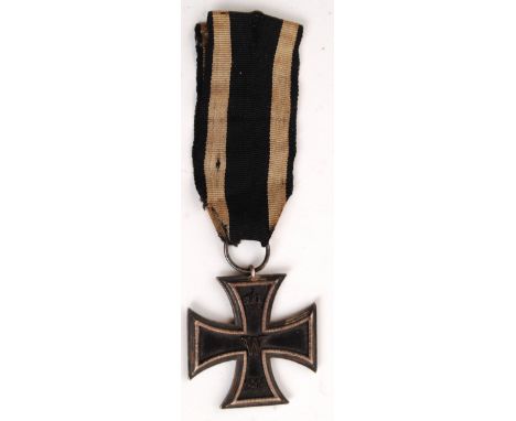 An original WWI First World War German Iron Cross medal, marked with imperial crown over W over 1914, (the reverse with imper