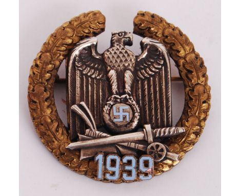 A German Third Reich Gau Badge. Gold and silver metal with enamel '1939' to base. The central emblem surmounted by a ring of 