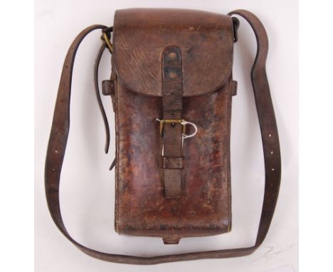 An original likely European WWI First World War uniform leather magazine / ammunition pouch. Slightly curved form, with openi