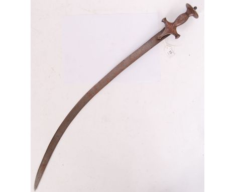 A rare early 19th century Indian Tulwar curved sword. With a decorative handle. 75cm long. POSTAGE: Worldwide postage / deliv