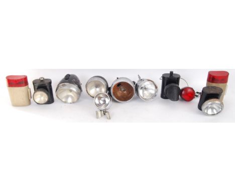 A collection of original vintage 20th century bicycle light mainly by Miller. Lights include both front & red rear lights. 