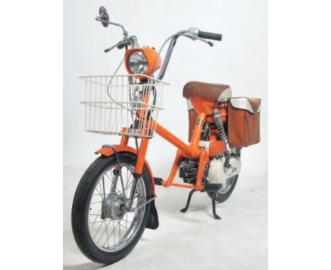 A fabulous vintage classic 1970's Honda Express motorcycle / moped. Registration number XOU 84T, 1979 model. First registered