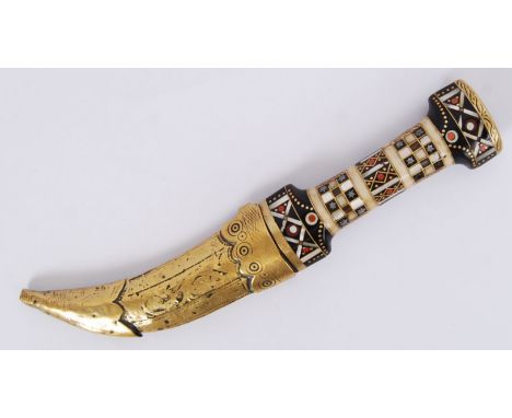 An original Middle Eastern Islamic curved blade decorative dagger with mother of pearl inlaid handle & brass scabbard. Measur