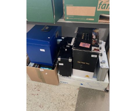 A boxed ION usb turntable, a projector, a box of CDs and DVDs and a metal box with CDs. 