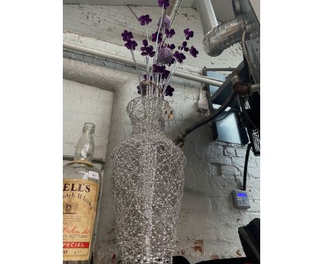 A large floor standing LED lamp in the form of a vase of flowers 