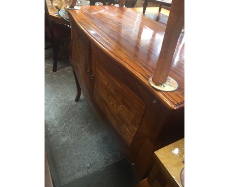 An inlaid mahogany bombe commode, height 93.5cm, width 120cm and depth 52.5cm. 