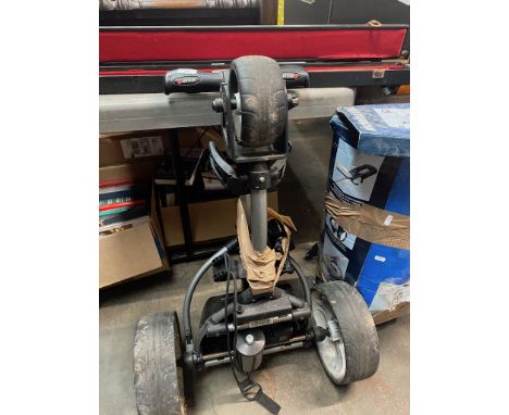 Electric motor caddy golf trolley with charger. 