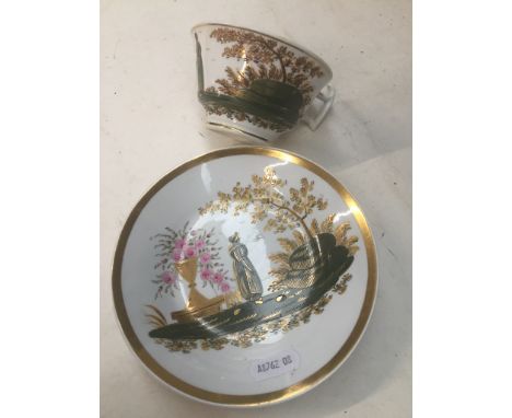 A hand painted cup and sauce.Condition Report: After inspection of this item, it is clear that there a few minor scratches on