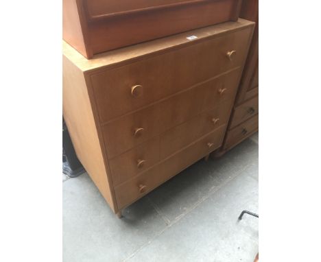 A mid 20th century light oak chest of drawers, height 89cm, width 76cm and depth 46cm. 