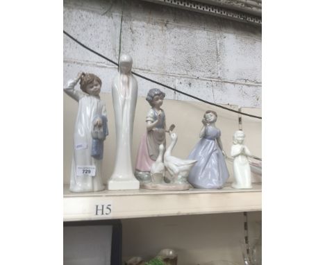 A group of 5 figures including 1 Nao, 1 Nadal, and 1 Royal Worcester 