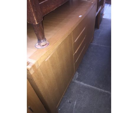 A modern light oak sideboard, length 154cm, depth 52cm and height 77cm. 