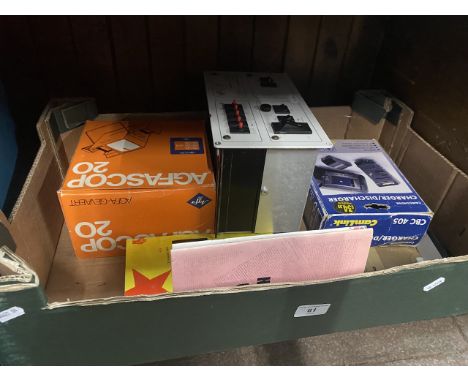 A box including a camper van inverter, socialist books etc. 