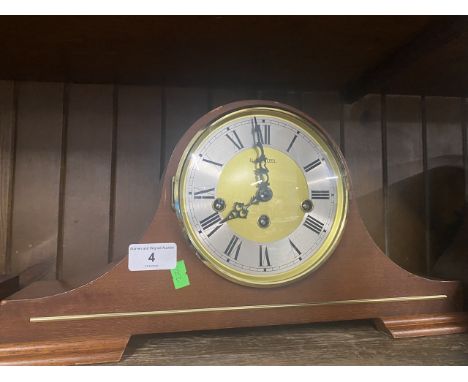 A H. Samuel German mantel clock with key. 