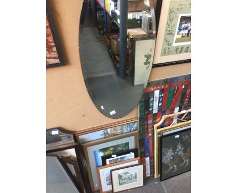 A collection of pictures, prints and mirrors to include a Lowry print, Stefanik print and a Seeley print etc 