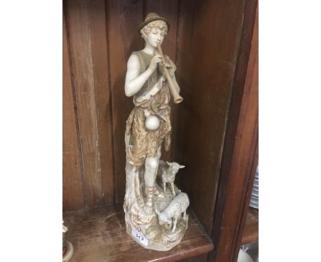 A Royal Dux porcelain figure group shepherd boy and sheep, height 38cm.Condition Report:After inspection this Lot 513 is dama