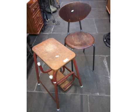 A vintage tubular metal and plywood chair and a vintage metal and plywood step stool. 