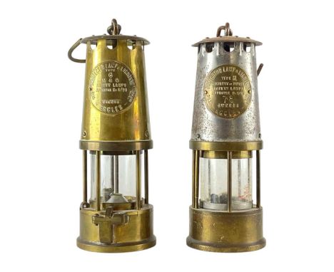 A brass and steel 'Protector' Lamp & Lighting Co Miner's lamp. Stamped number 78, height 25cm, together with a similar brass 