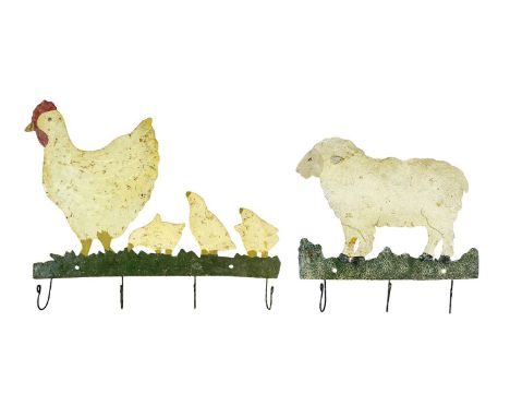 Two painted tin kitchen utensil racks. 20th century, one as a hen and three chicks, with four hooks, width 40cm, the other as