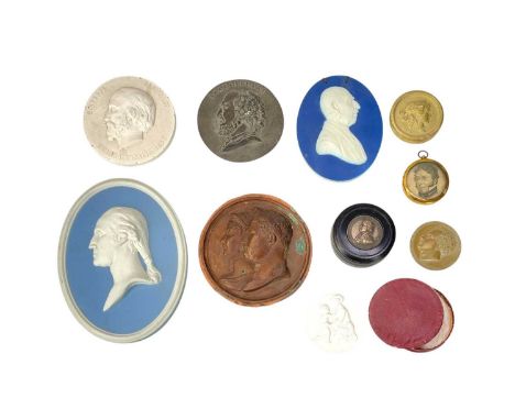 A 19th century miniature portrait printed on silk.  Inscribed '...Leopold of Saxe Coburg' to verso, in circular brass frame, 