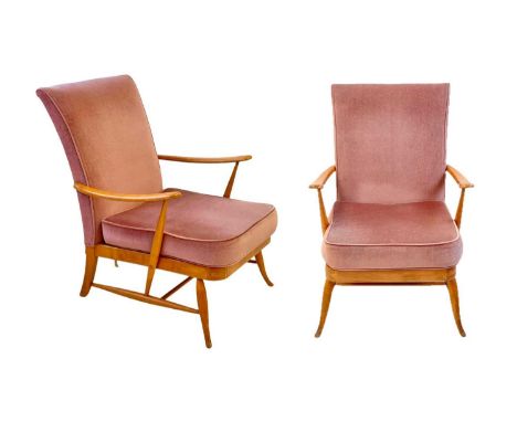 A pair of Ercol lounge chairs. With fixed backs, removable seat cushions, upholstered in a pink velour, tension springs, both