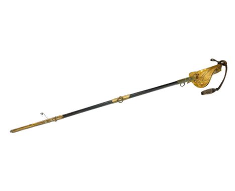 A Victorian Naval officer's presentation sword. The 71.5cm straight fullered blade with conventional etched decoration and an