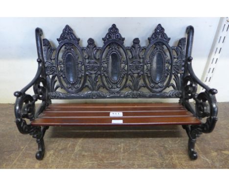A miniature Coalbrookdale style bench