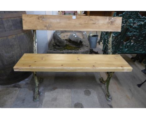 A cast iron railway bench