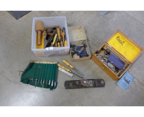 Assorted vintage tools including planes and chisels, etc.