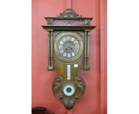 A 19th Century German walnut clock, barometer and thermometer