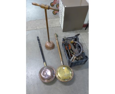 A box of tools, warming pans, etc.