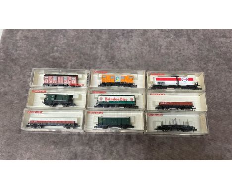 18 Fleischmann freight and goods wagons    9 Fleischmann N Gauge Freight/goods wagons  8200, 8207, 8220, 8281, 8325, 9330, 83