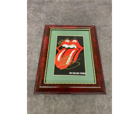 A framed Rolling Stones tongue singed by Mick Jagger and Keith Richards. Frame size 20cm x 25cm