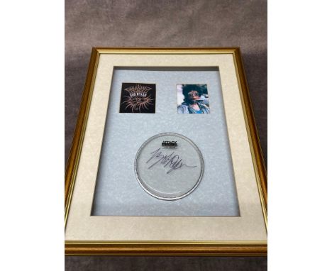 A framed singed drum head by Bob Dylan,  Â£150-Â£200    Frame size 45cm x 55cm