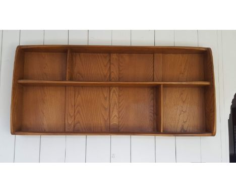 A mid century Ercol wall mounted plate rack